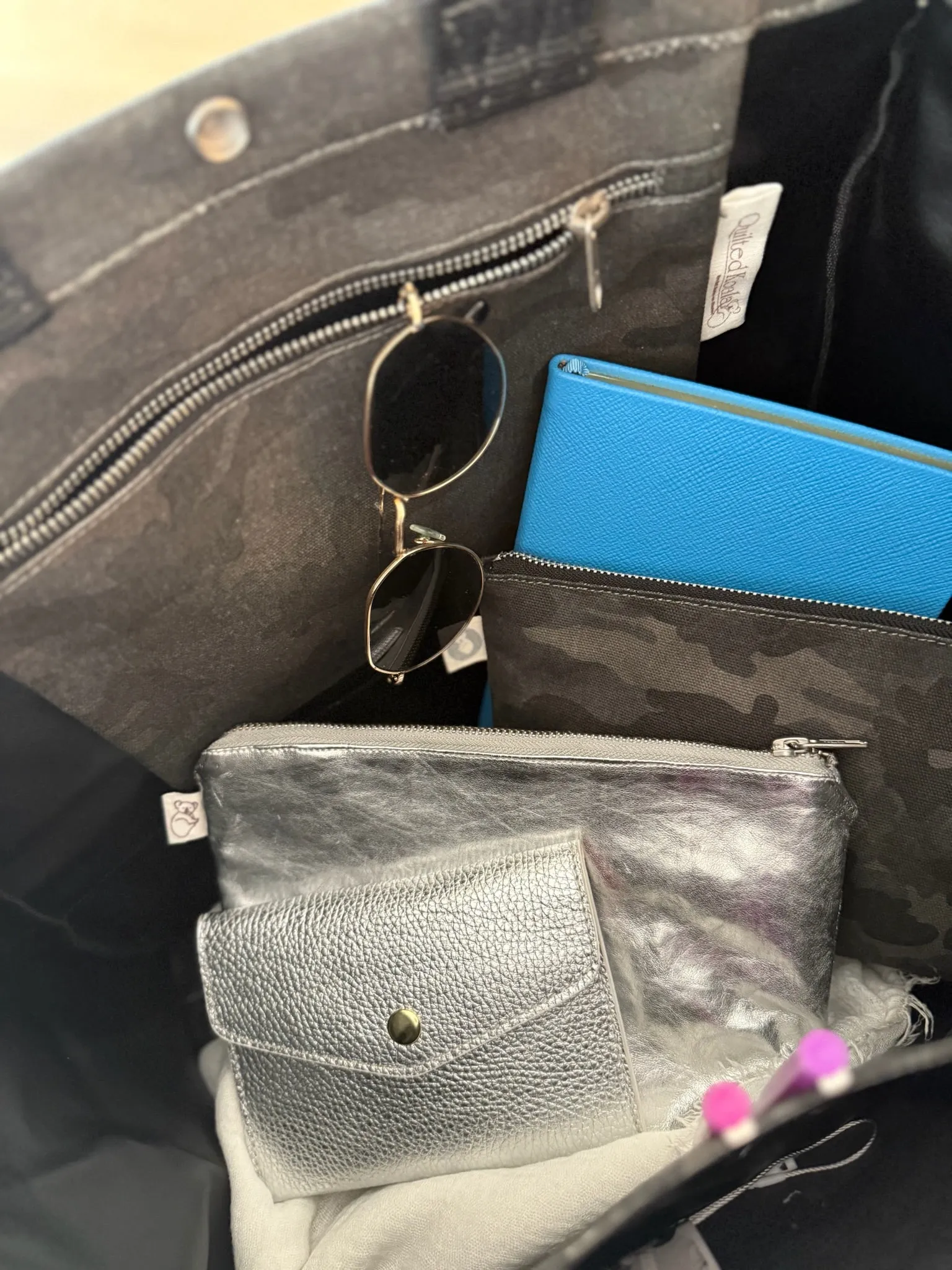 Stephanie's Pick: Black Camo Luxe North South Bag   FREE Black Tassel   FREE Black Heart Charm   FREE Black/Pink Stripe Strap