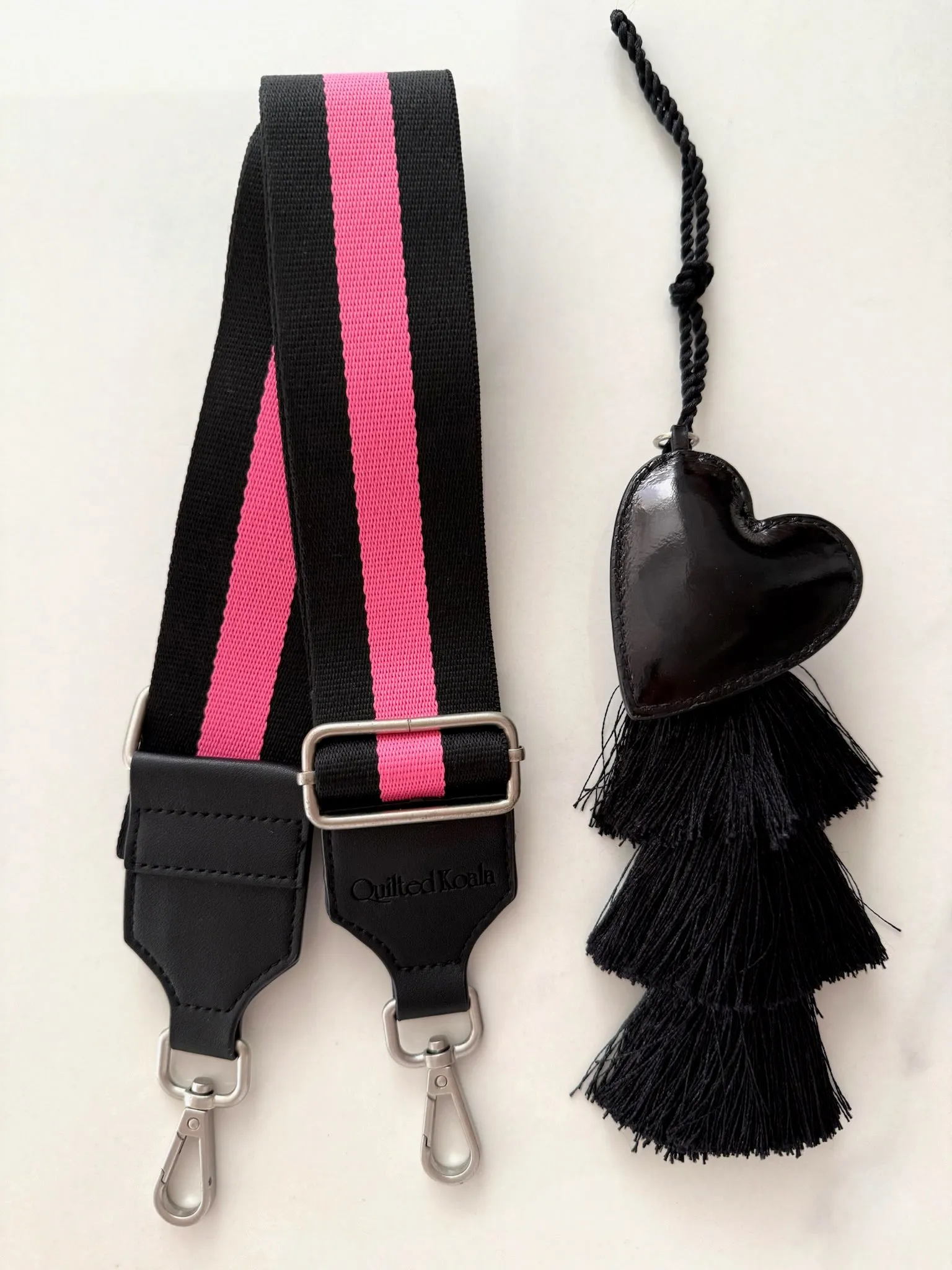 Stephanie's Pick: Black Camo Luxe North South Bag   FREE Black Tassel   FREE Black Heart Charm   FREE Black/Pink Stripe Strap